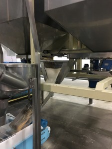 Conveyor hopper at an Almond processing facility