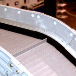 Conveyor sidewall brushes