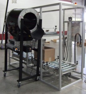 DynaCon box filling by weight with parts separator.
