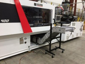 DynaCon conveyors being used in the molding of truck parts.