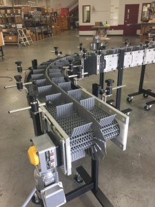 DynaCon radius turn conveyor.