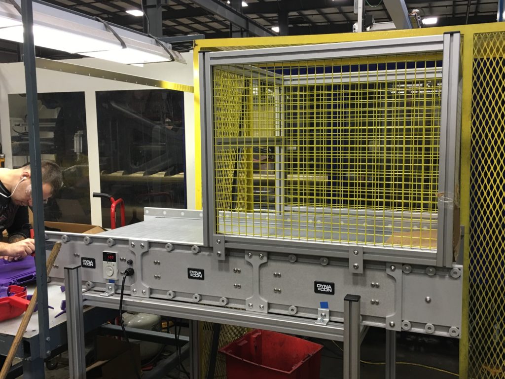 Robot Cage Flat DynaCon (2) DynaCon flat conveyor with robot cage