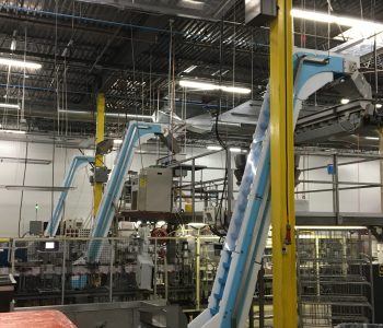 3 Tall DynaClean Z Conveyors at Georgia Nut for conveying panned chocolate