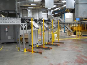 Exit chutes on DynaCon conveyors