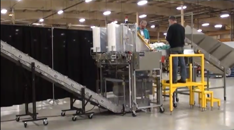 How to Find the Ideal Conveyor for Auto-Bagging Commercial & Industrial Laundry