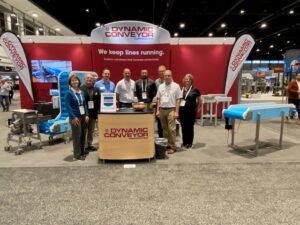 The Dynamic Conveyor team in front of our booth at PackExpo 2022 in chicago