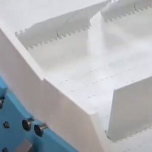 A close up of the drive flights on a DynaClean conveyor