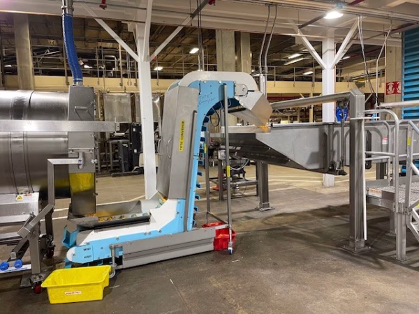 Bulk Fill More Bakery 1 bulk bakery filling conveyor system with baking ingredients transporting on conveyor belt