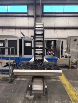 Hybrid with Hopper vibratory bin hopper for a bulk material conveyor filling system