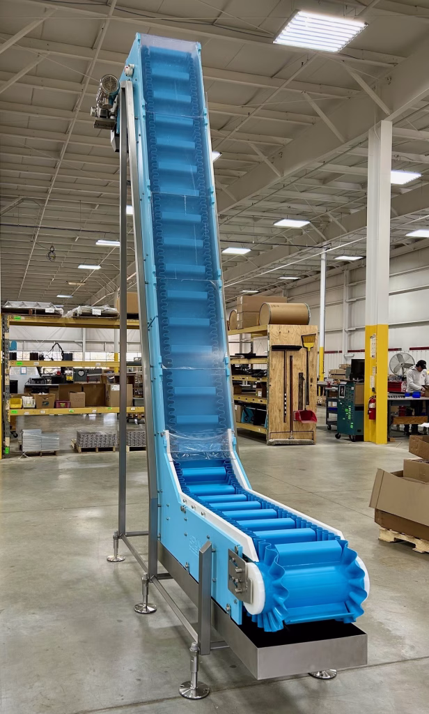 DynaClean vertical z conveyor with covers and catch pans