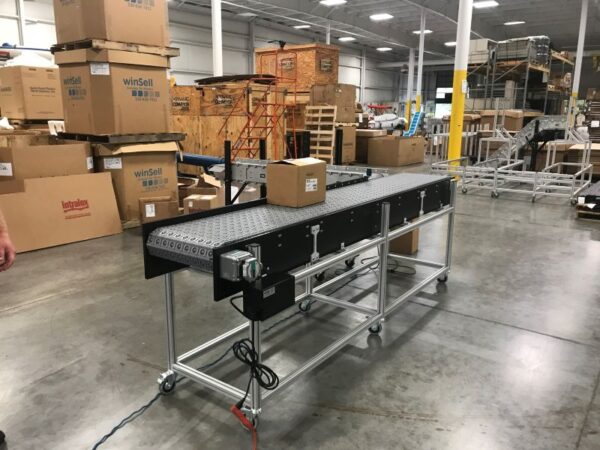 box-sorting-conveyor-belt Section of box sorting conveyor with box on top of conveyor belt