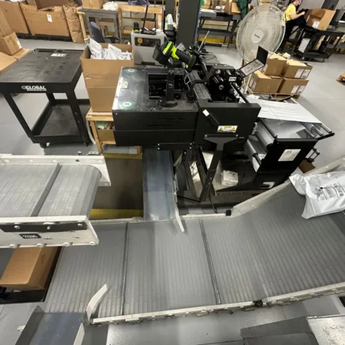 DynaCon custom apparel warehouse conveyor installed at Robinson Mfg