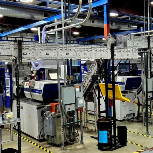 overhead conveyor system installed in a manufacturing facility