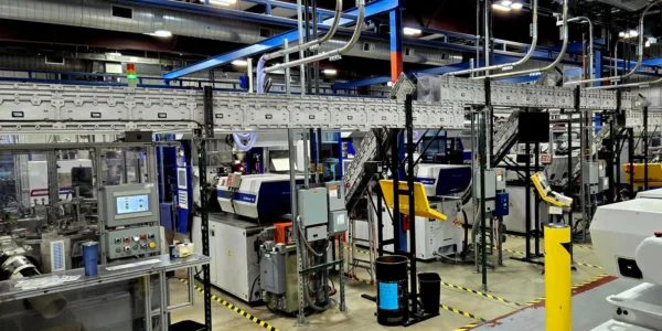 overhead conveyor system installed in a manufacturing facility