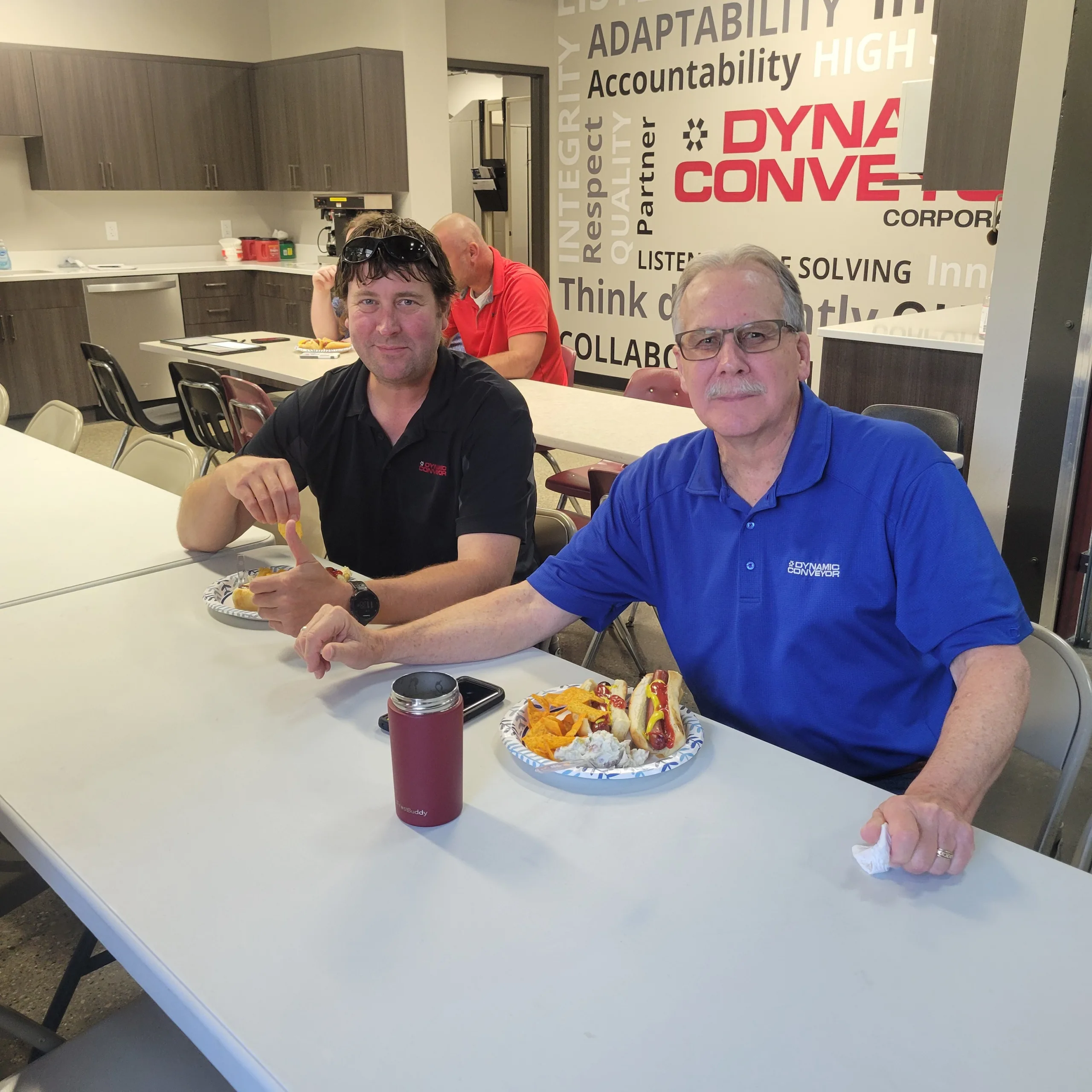 Dynamic Conveyor employees enjoying lunch at July 4th cookout