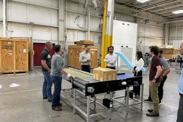 Intralox staff meeting with Dynamic conveyor workers