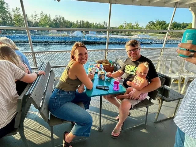 Koopman Family at table on cruise boat