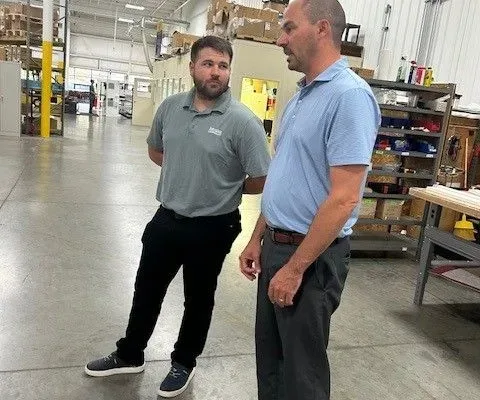 Jordon and Benny at Dynamic Conveyor discussing Intralox partnership and products