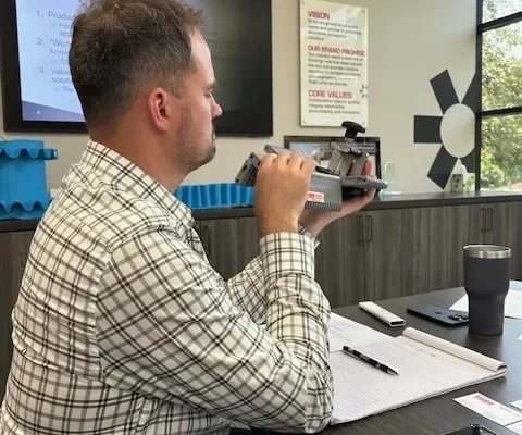 Matt reviewing a new product idea with Intralox components