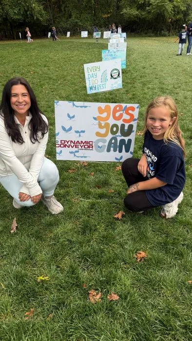 Lewis family by Dynamic Conveyor yard sign for walkathon 2025