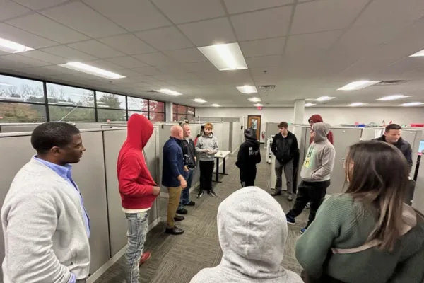 Tom-with-Students-2025-mfg-week Tom Foley sharing his career at Dynamic Conveyor with Students