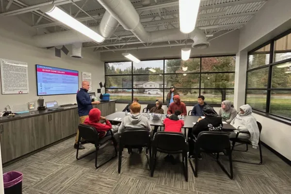 muskegon-students-mfg-week-2025 Students in conference learning about our company