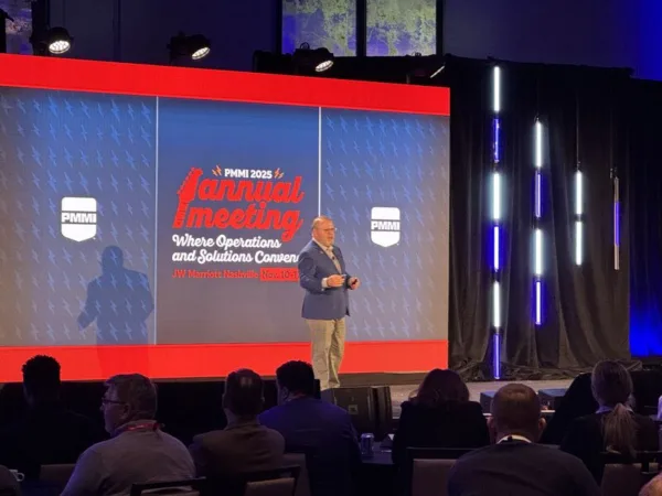 speaker on stage at the 2025 PMMI packaging industry meeting