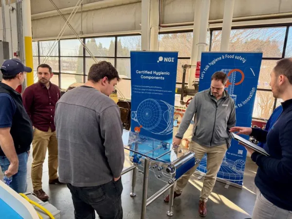 Dynamic Conveyor Staff reviewing new hygienic designs from NGI