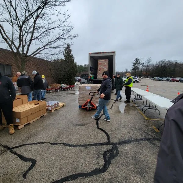 Jaime-Feeding-America Jamie unloading pallet of food