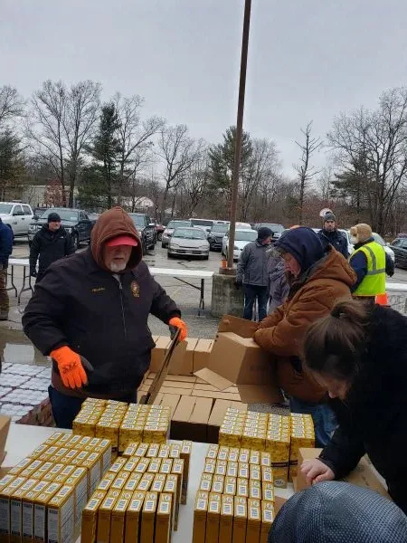 feeding-america-volunteers-2026-11 workers sorting food for charity event