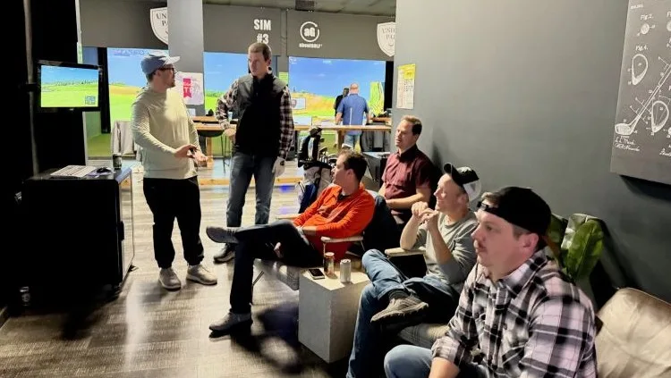golf-night-lounging Dynamic Conveyor staff hanging out at local golf simulator after hours