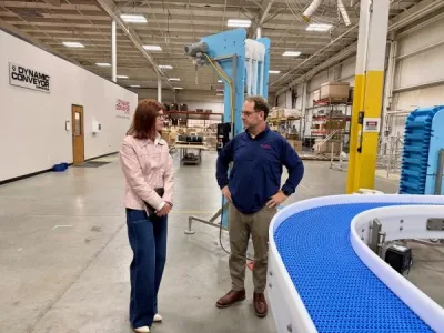 Intralox staff member Maribeth with Steve Wexall, Dynamic Conveyor's VP and GM