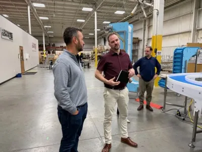 Joe from Intralox and Matt from Dynamic Conveyor in conversation at the Dynamic Conveyor facility