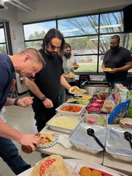2026-Cinco-De-Mayo-2 team putting together tacos for cinco de mayo