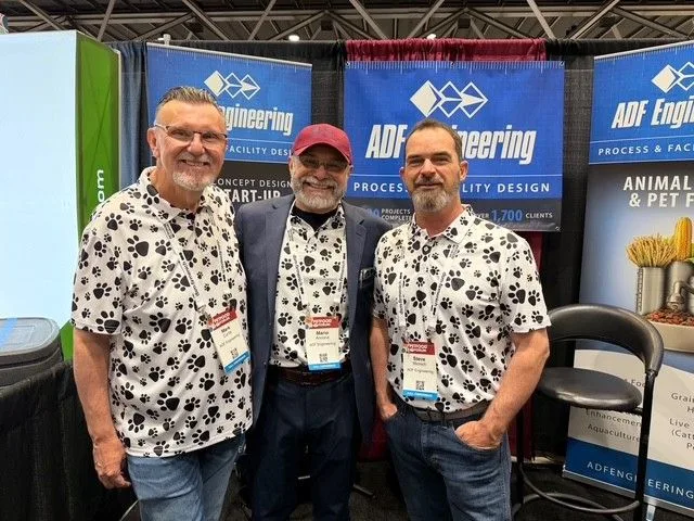 Paw-Print-Shirts-Forum-2026 Exhibitors wearing paw print shirts at Pet Food Forum