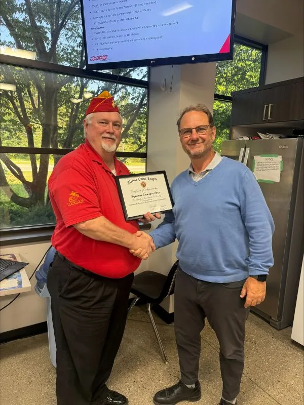 Steve-Scott-memorial-day-2026 Steve Wexall receiving award for Dynamic Conveyor from marine corps