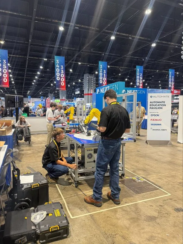 processed-automate-2026 robotic arms at expo booth