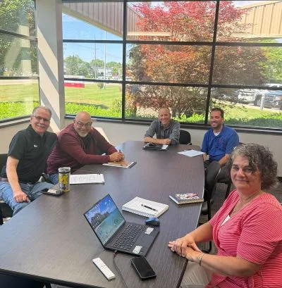 Dynamic Conveyor sales team together at the lunch and learn gathering