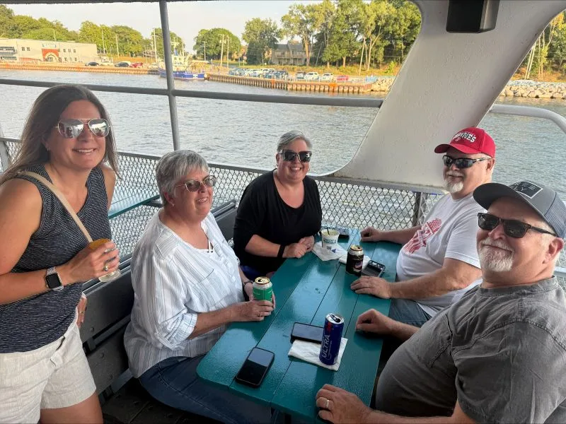 Sarah-Dave-Scott-2026-cruise Sarah, Dave and Scott with family and friends on the sunset cruise