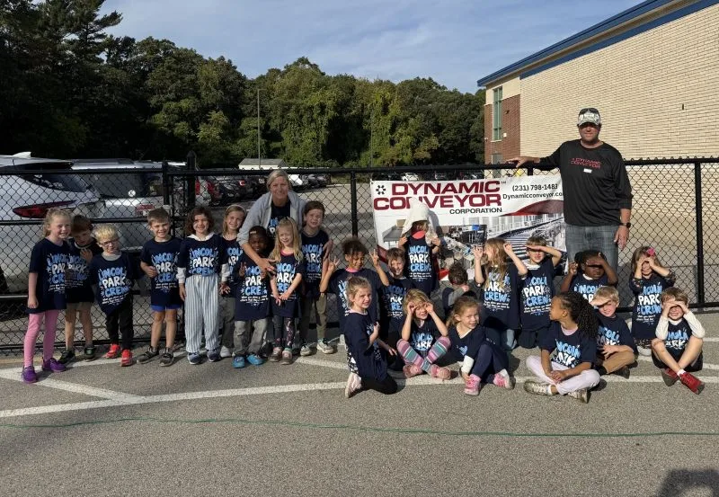 2026-walkathon-group-pic Lincoln Park Elementary School students by the Dynamic Conveyor banner for the walkathon event